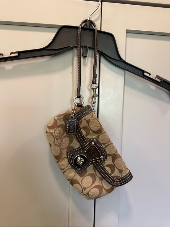 Coach Handbags - Coach Legacy Signature Canvas Turn Lock Wristlet
